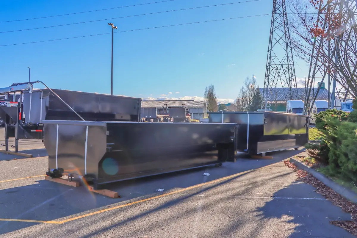 Roll-off dumpster ready for waste disposal at job site for 12 Yard Dumpster Rental in Brandon